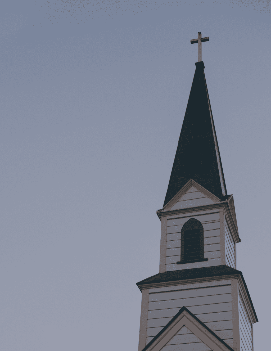 A cross at the top of a church